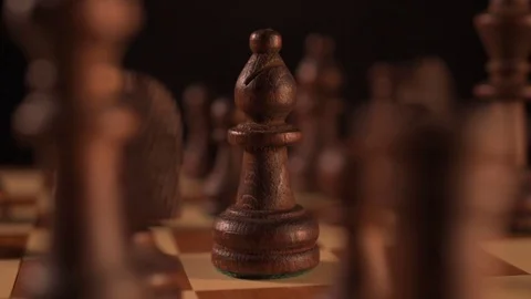 Black Bishop chess piece tracking shot on black background 스톡 동영상 116270272