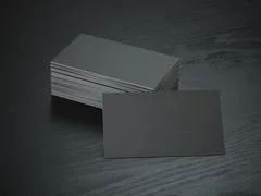 Stack of black blank business cards mockup on black wood table background,  Stock Illustration