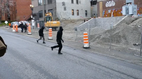 Black bloc protesters being aggressive Stock Footage 114761751