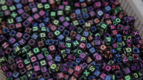Black blocks with colored letters Stock Footage 70771237