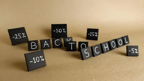 Black blocks spelling Back to School with discount percentages Stock Photos