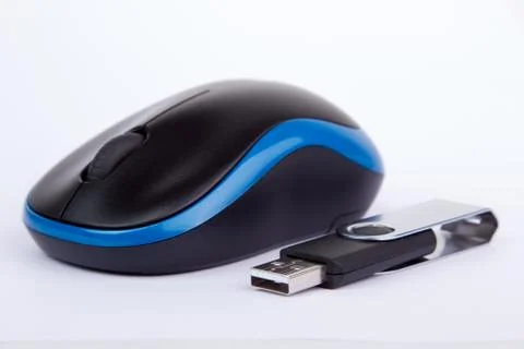 Black blue computer mouse with an usb stick Stock Photos