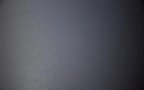 Black blurred solid color background. Texture, gradient, vignetting, close-up Foto stock