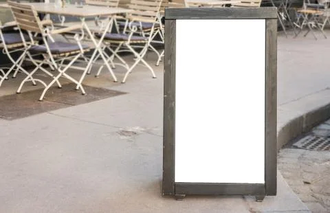 Black board on sidewalk Foto stock