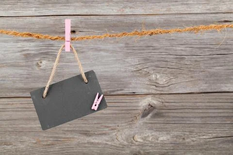 Black board of slate on old rustic wooden background, Stock Photos