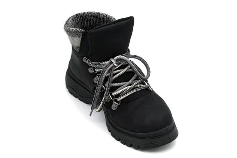 A black boot isolated on a white background Stock Photos
