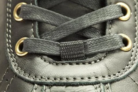 Black boots laced Stock Photos
