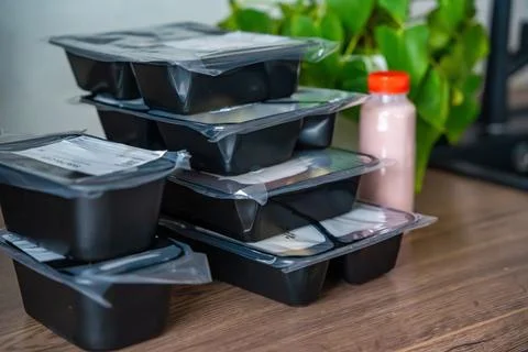 Black boxes with healthy diet plan for weight loss, delivery of daily ready.. Stock Photos