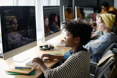 Black Boy Coding on Computer in Class 写真素材