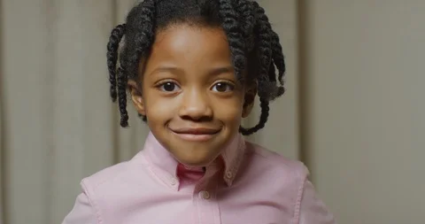 Black boy with dreadlocks smiling and looking at the camera Stock Footage 104100985