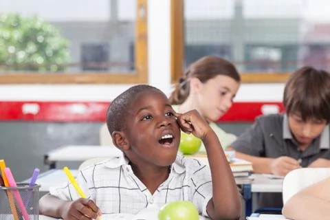 Black boy thinking Stock-Fotos