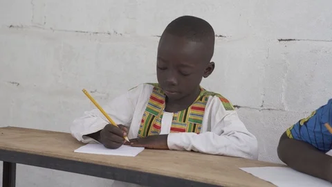 Black Boy Writing Stock Footage 97219524