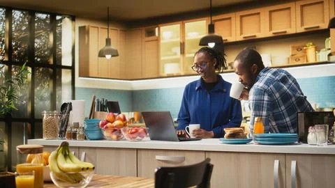 Black boyfriend and girlfriend making a delicious breakfast meal Stock Photos