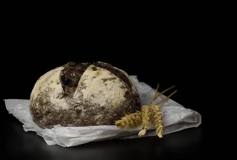 Black bread and wheat Stock Photos