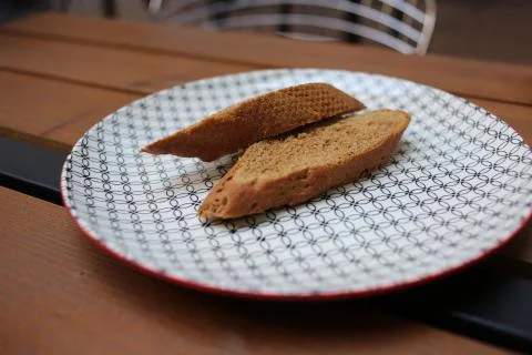 Black bread on plate. Close up Stock Photos
