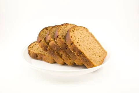 Black bread sliced on a plate Stock Photos