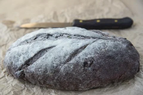 Black bread with walnuts and raisins Stock Photos