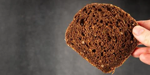 Black bread whole-grain rye flour slices of dark bread healthy eating delic.. Stock Photos