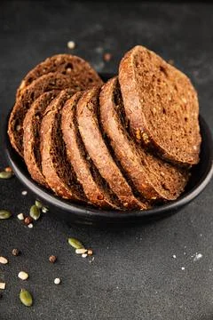 Black bread whole-grain rye flour slices of dark bread healthy eating delic.. Stock Photos
