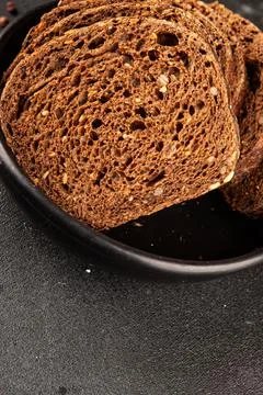 Black bread whole-grain rye flour slices of dark bread healthy eating delic.. Stock Photos