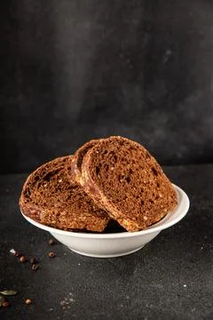 Black bread whole-grain rye flour slices of dark bread healthy eating delic.. Stock Photos
