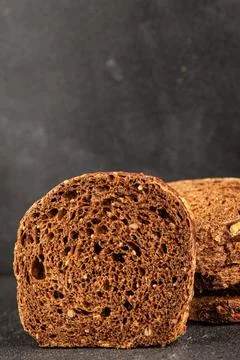 Black bread whole-grain rye flour slices of dark bread healthy eating delic.. Stock Photos