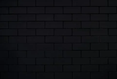 Black brick grunge wall vector background dark wall. Stock Photos