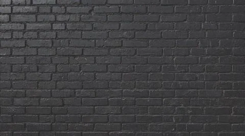 Black brick wall background texture. Fotos Stock