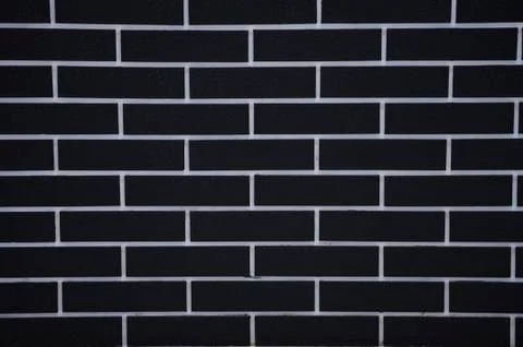 Black brick wall design Stock Photos