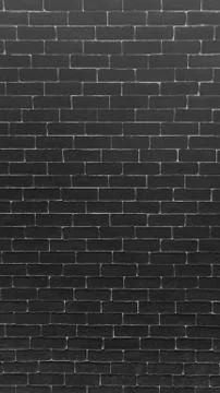 Black brick wall pattern texture background. Stock Photos