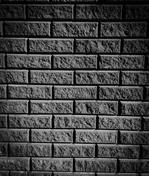 Black brick wall Stock Photos
