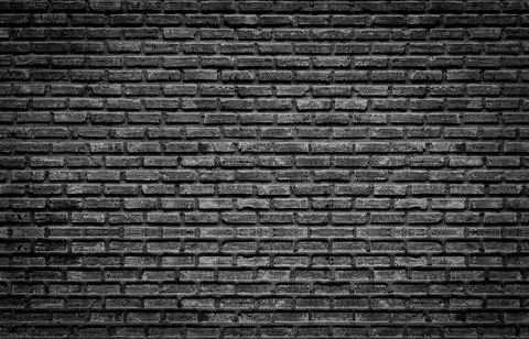 Black brick wall texture, black background, vintage wallpaper Stock Photos