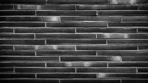 Black brick wall texture, brick surface for background. Vintage wallpaper. Foto stock