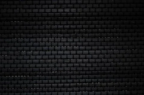 Black brick wall texture, brick surface for background. Vintage wallpaper. Stock Photos