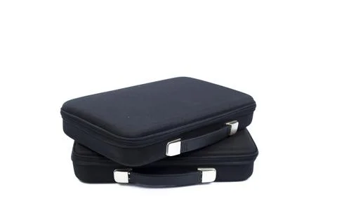 Black briefcase overlapping. Stock Photos
