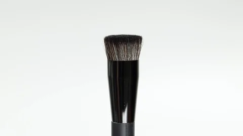 Black brush for cosmetics on a white background Stock Footage 127504086