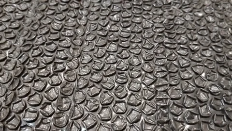 Black bubble wrap packaging material isolated for safe shipping and secure stora Stock Footage 338224869