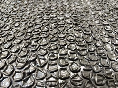 Black bubble wrap packaging material isolated for safe shipping and secure stora Stock Photos