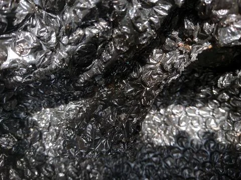 Black Bubble Wrap Plastic Texture Close Up Background Stock Photos