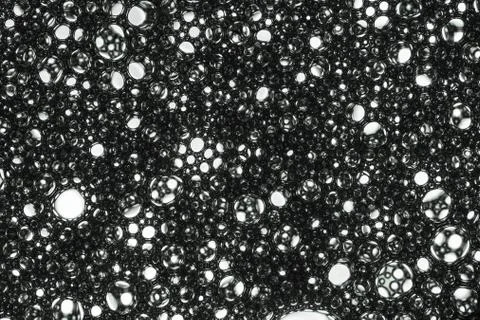 Black bubbly pattern Stock Photos