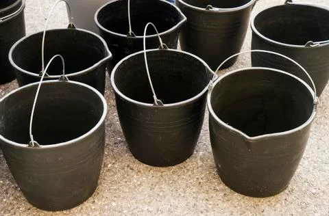 The black buckets pails Stock Photos