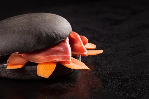 Black burger. Stock Photos