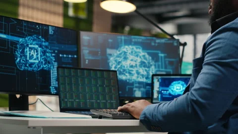 Black businessman using AI digital tools and machine learning models Stock Footage 313907845