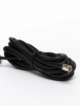 Black cable with connector coiled Stock Photos