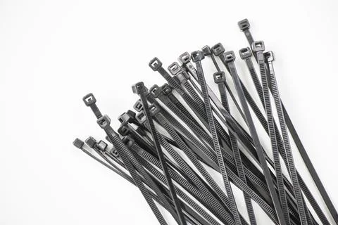 Black cable tie on the white background Stock Photos