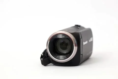 Black camcorder camera on white background Стоковые фото