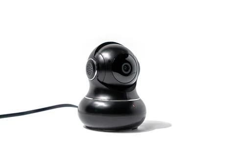 Black camera with black body and cord. Stock Photos