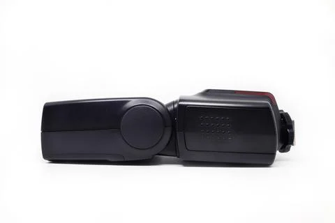 Black camera flash isolated on white background. Clipping path included. Stock Photos