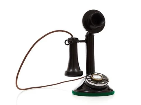 A black candlestick phone on a white background Stock Photos
