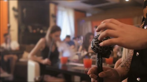 Black cane in the form of skull in the hands of men. The background is not in Stock Footage 111175054